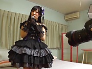Sweet Japanese teen in a black dress enjoys hardcore cosplay
