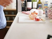 Amateur Japanese milf sucks dick in the kitchen