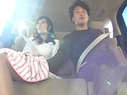 Juicy Japanese milf featured in a sleazy car sex