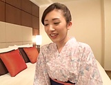 Milf in a kimono is using a vibrator