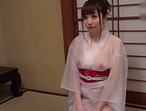 Woman in a kimono is sucking a hard dick