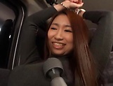 Kinky Japanese AV model gets her pussy toyed and gives head in a car picture 15