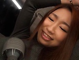 Kinky Japanese AV model gets her pussy toyed and gives head in a car picture 17