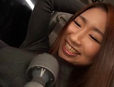 Kinky Japanese AV model gets her pussy toyed and gives head in a car picture 18