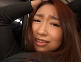 Kinky Japanese AV model gets her pussy toyed and gives head in a car picture 37