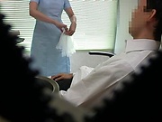 Hot Japanese nurse blows a cock and gives a handjob in her office
