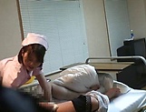 Crazy Japanese nurse seduces a guy in a ward giving a handjob picture 15