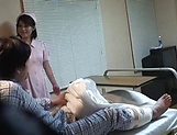 Crazy Japanese nurse seduces a guy in a ward giving a handjob picture 1