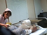 Crazy Japanese nurse seduces a guy in a ward giving a handjob picture 8
