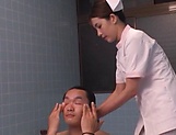 Smoking hot Japanese nurse fucks with a guy in the bath picture 21