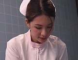 Smoking hot Japanese nurse fucks with a guy in the bath picture 9