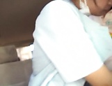 Glorious Tokyo nurse in a uniform gives a terrific blowjob in a car picture 28