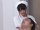 Luscious Japanese nurse tempts her patient during hygienic procedures picture 13