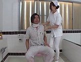 Kinky Tokyo nurse enjoys hardcore sex in a bath with her patient picture 1