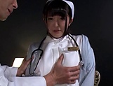 Amazing Japanese nurse is being naughty picture 6