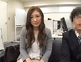 Gorgeous Japanese milf fucks with a younger dude in the office picture 15