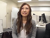 Gorgeous Japanese milf fucks with a younger dude in the office