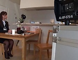 Hot milf using a dildo in the kitchen