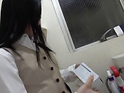 Japanese office lady Yuuki Karina sucks a cock in a toilet