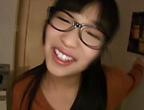 Teen with glasses gives a great blowjob