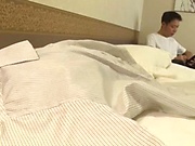 Hot office lady Harusaki Ryou giving a hand job in a hotel room