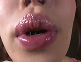 Racy lady in erotic lingerie eats cum