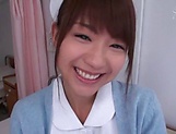 Cheerful Japanese nurse cannot get enough of a big cock picture 13