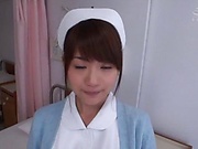 Flaming Japanese nurse treats herself with a big dick