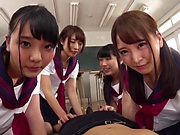 Mischievous Japanese schoolgirls dominate a dude in a group scene