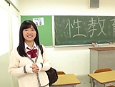 Smiling Japanese schoolgirl sucks a dildo and a real cock picture 12
