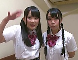 Two Japanese schoolgirls enjoy a mmf sex play