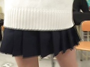 Sweet Japanese schoolgirl in a mini skirt spreads legs for pounding