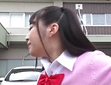 Cute Asian schoolgirl in a pink costume fucks with handsome guys